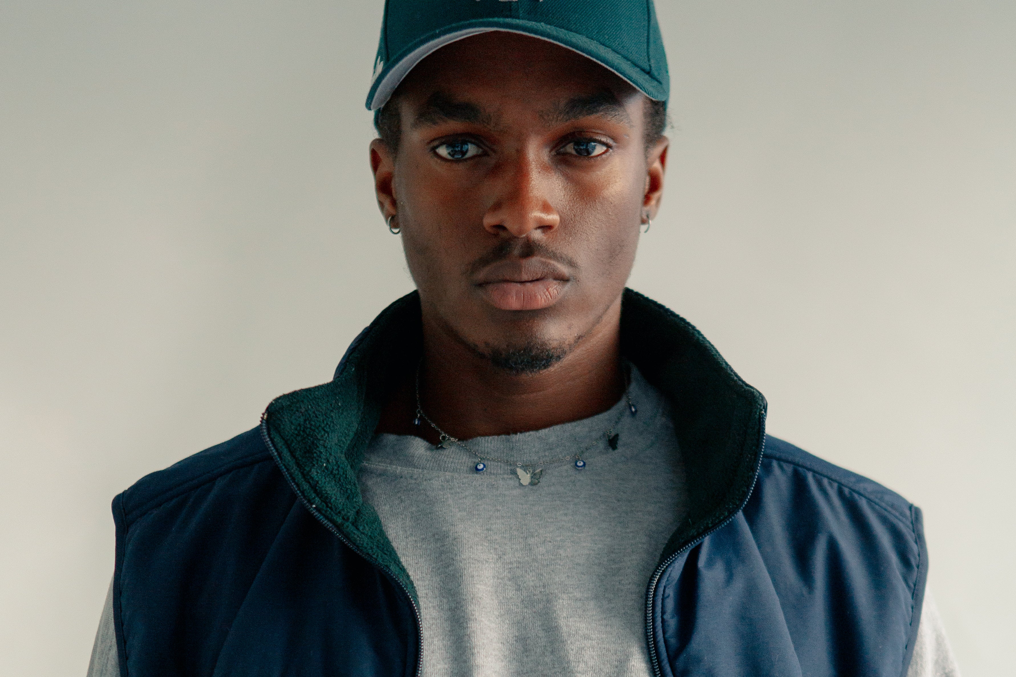 files/man-dressed-in-grey-and-blue.jpg